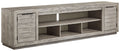 Naydell - XL TV Stand With Fireplace Option - Gray